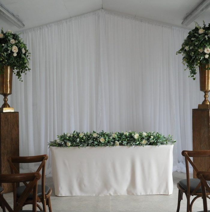 wild floral display on timber plinth