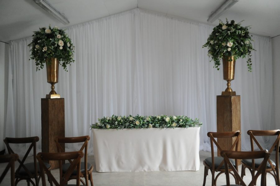 wild floral display on timber plinth