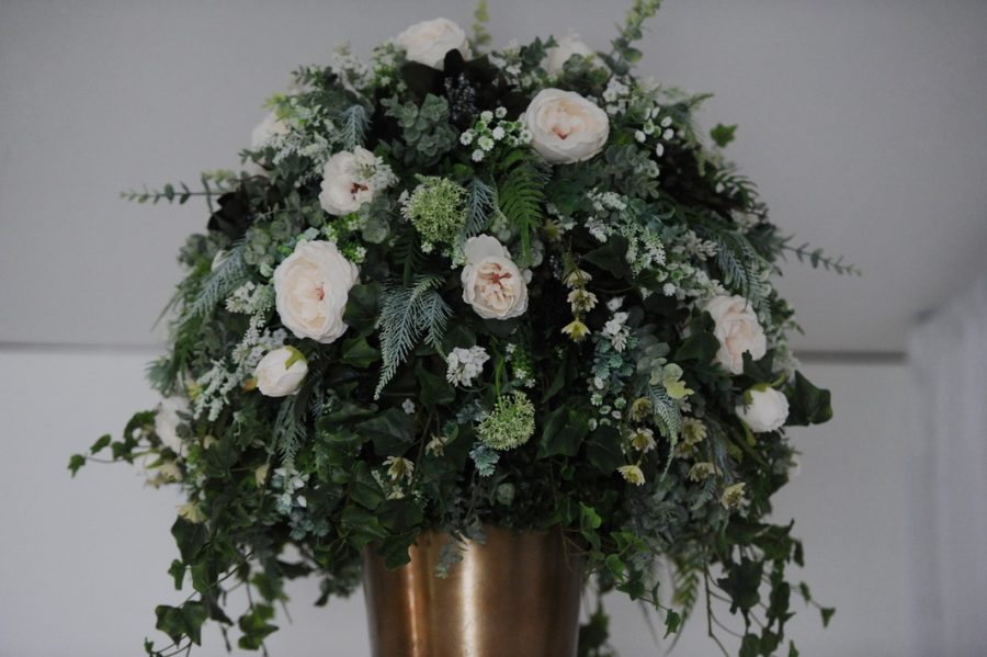 wild floral display on timber plinth