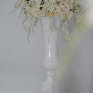 Cream floral display with pearl plinth